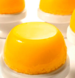 Easy and Practical Quindim in just 40 minutes! This Brazilian dessert features a creamy egg yolk and coconut filling baked to perfection.